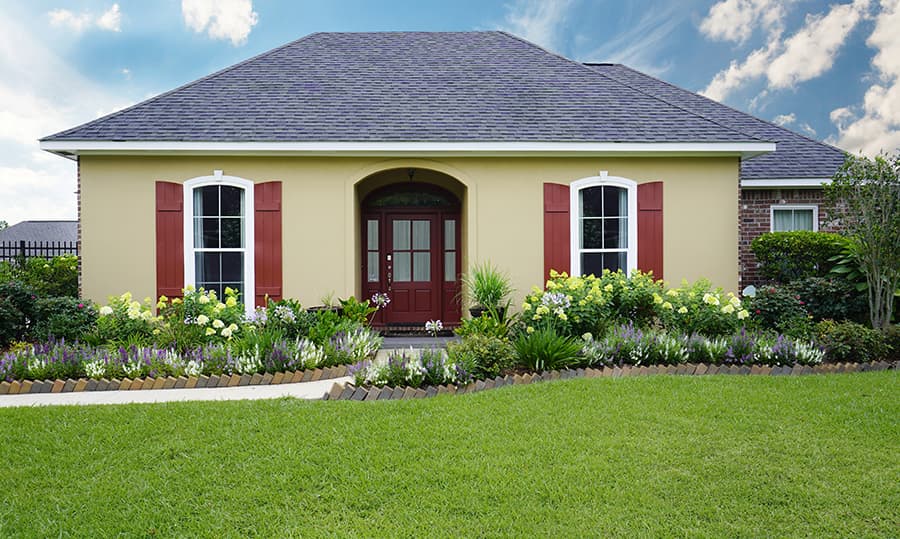 exterior of home with red door and shutters