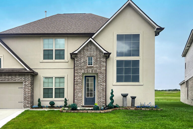 Two-story brick home exterior