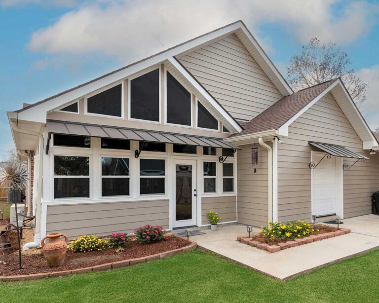 Backyard view with beige siding